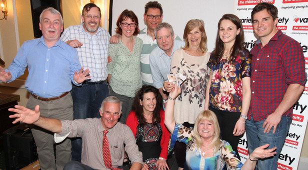 'Magnificent Nine’ with quizmaster Ricci Cobelli, front left, and Frances Cornelius, chair of Variety Wessex, front right