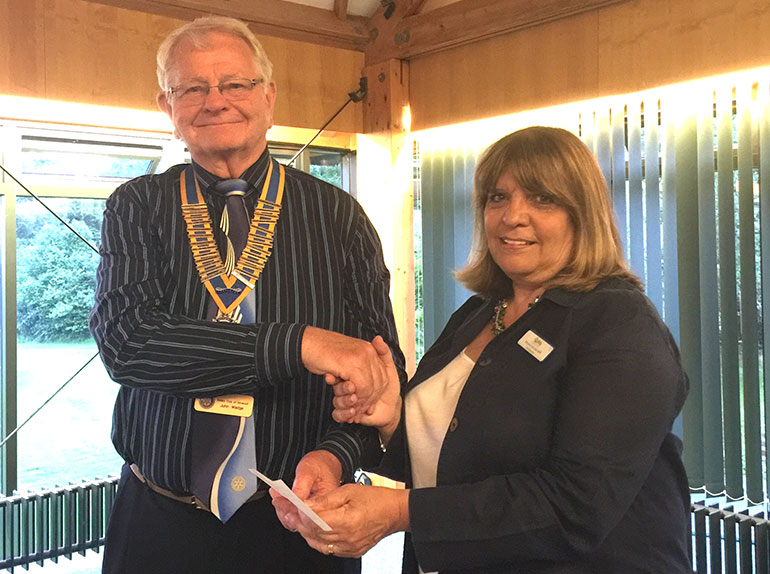 Verwood Rotary president presents cheque to MOSAIC CEO Margaret Hannibal