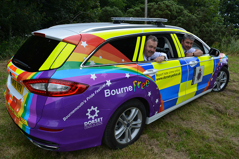 Police car specially decorated for Bourne Free, Bournemouth’s Gay Pride Event