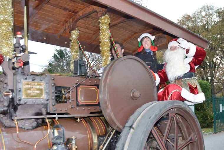 Santa arrives on Smokey with driver Jim Gerrard at Christchurch