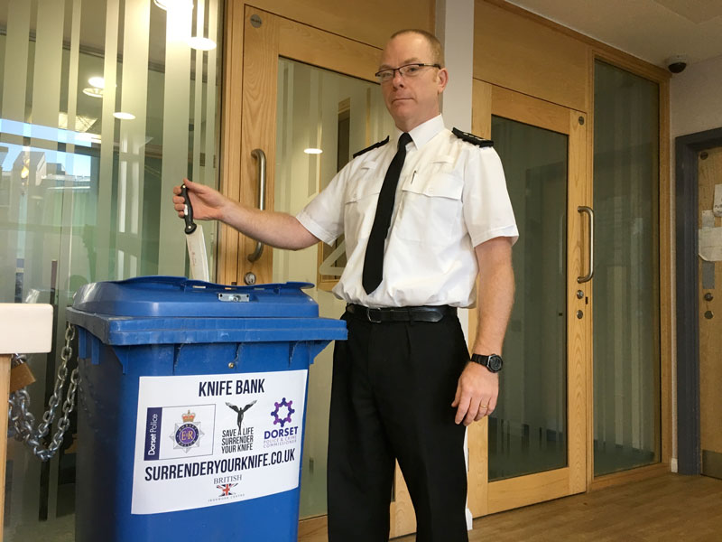 Chief Inspector Mike Claxton and one of surrender bins