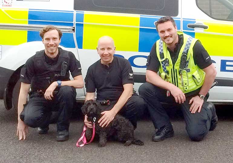 Sophie with (L-R) Police Constable Steve Lea, Police Sergeant Keith Clothier and Police Constable Jon Bedwell