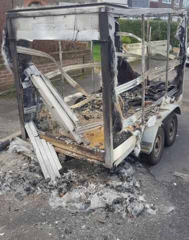 A large trailer set on fire and destroyed on Barnes Crescent
