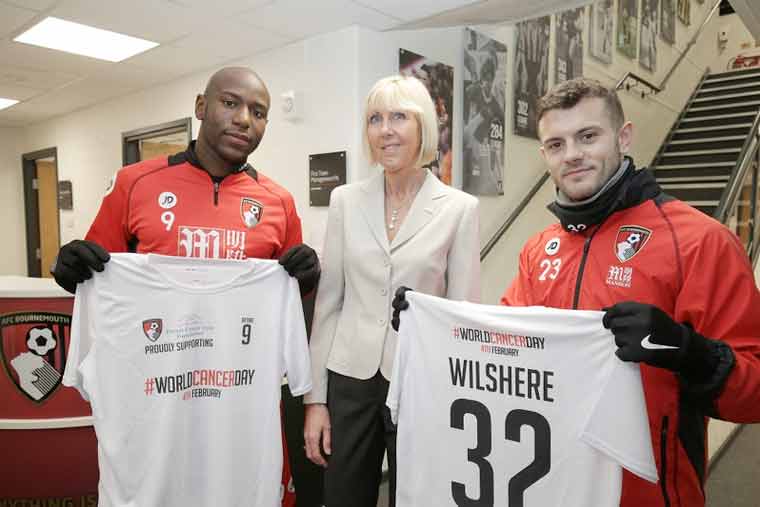 Bournemouth football players Jack Wilshere and Benik Afobe mark World Cancer Day