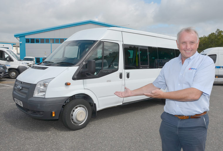 Abacus offering a minibus to winning charity