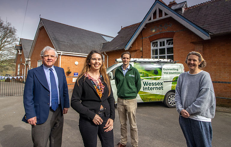 From L-R Dorset Council’s deputy leader, Cllr Peter Wharf, chairman of Dorset LEP, Cecilia Bufton, Wessex Internet MD Hector Gibson Fleming and headteacher of Durweston School, Nicola Brooke