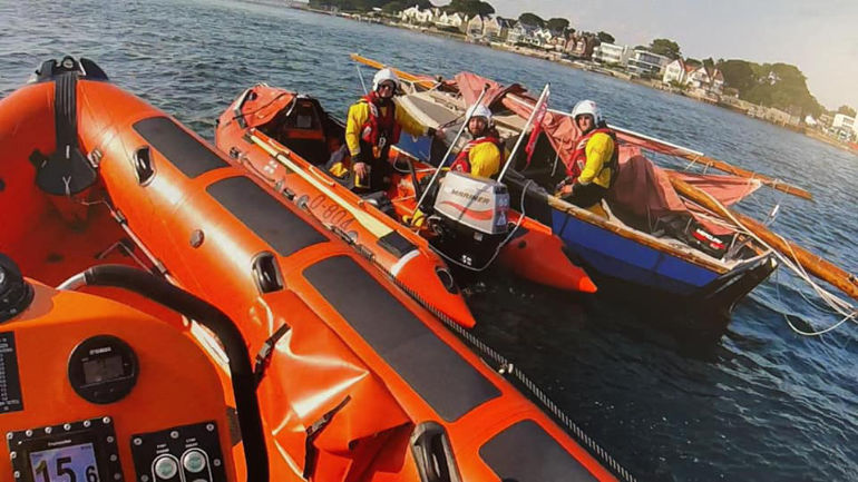 Cornish Shrimper is caught by Poole lifeboat crew after it is released from the ferry