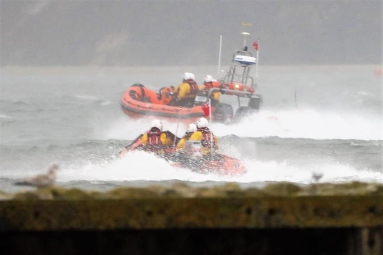 Both Poole lifeboats attended the first call out of the year in squally conditions