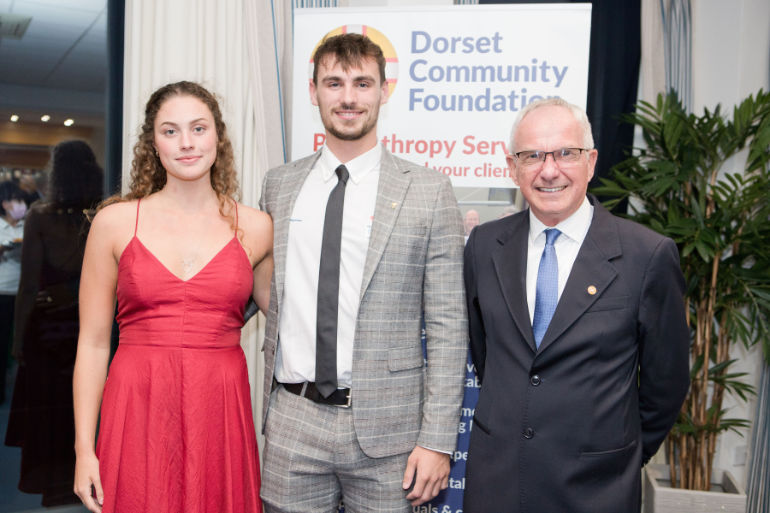 Dorset Community Foundation chairman Tom Flood with Olympic swimmer Jacob Peters and his girlfriend Charlotte Prince-Rayner at an event to mark the foundation’s 21st birthday