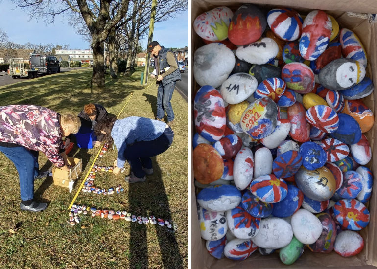 Left: Staff and councillors arrange the painted pebbles on the Petwyn