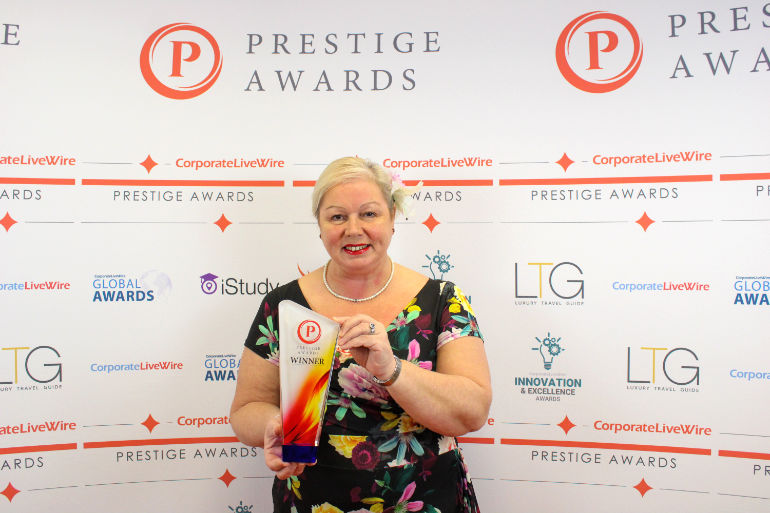 Mandy Polkey with award for Event Management Company of the Year - South West England Prestige Awards