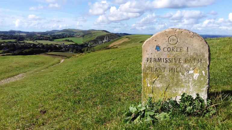 Walking Post Image - View towards Corfe Castle from the Purbeck Ridge Dorset. Credit - Visit Dorset