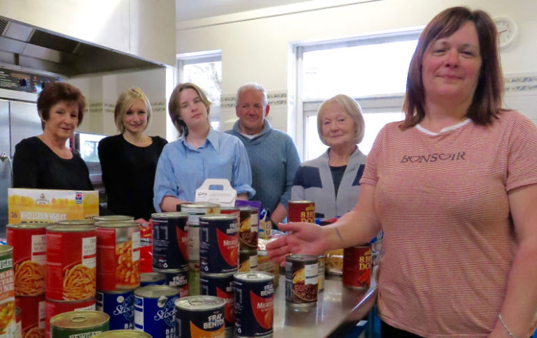 Hannah Hobbs-Chell (second from left) with volunteers at the opening of Ferndown Community Larder