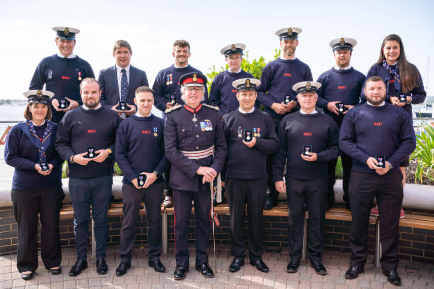 Poole RNLI volunteers with Angus Campbell, Lord-Lieutenant of Dorset (image by Chloe Palmer Photography)