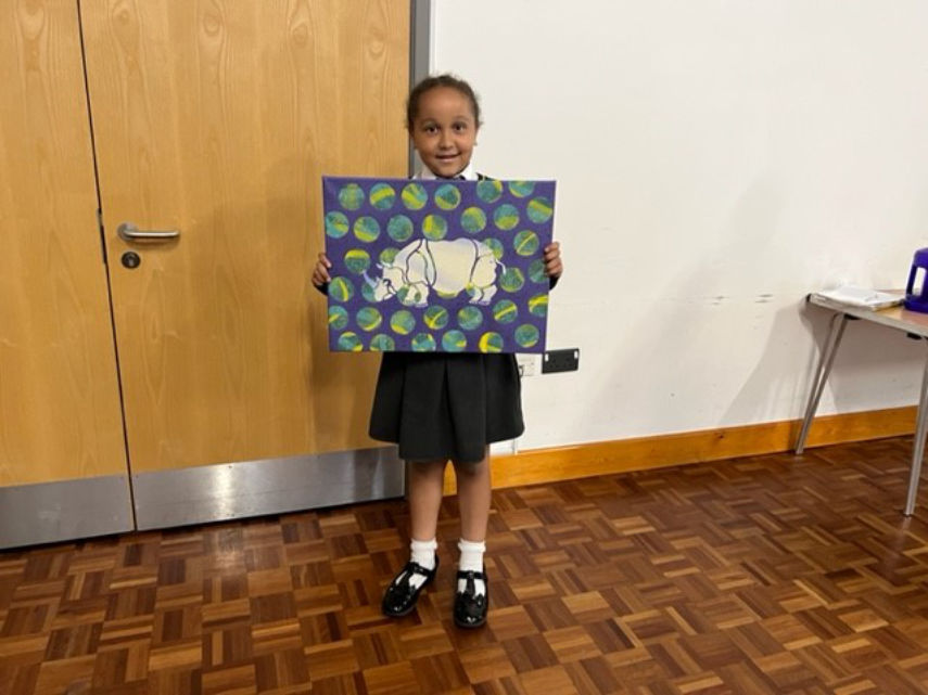 Angela with her artwork