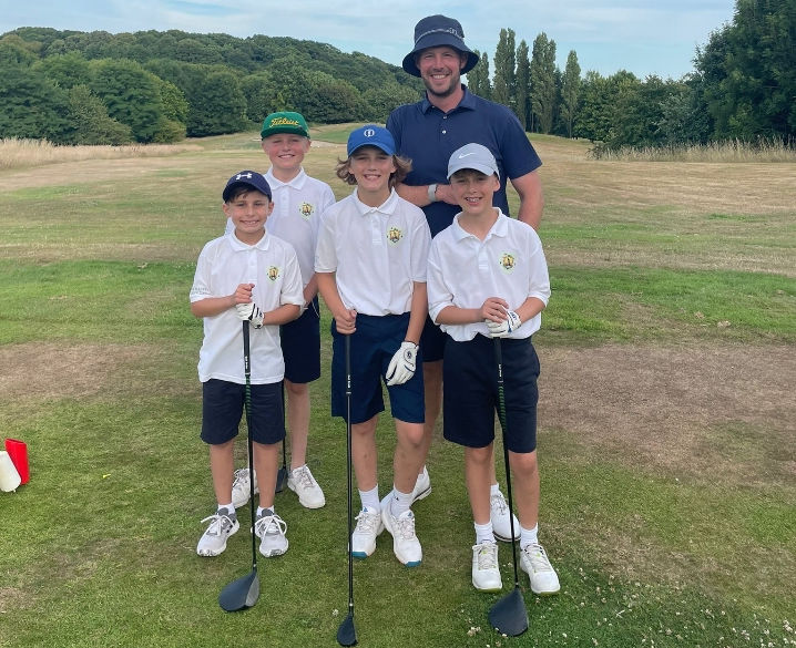 Harvey's Army Juniors with golf pro Luke Joy
