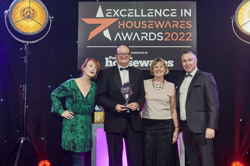 David and Ione Crossley (centre) receive their Excellence in Housewares Award from host and comedienne Sara Barron and Simon Oliver from category sponsor Tower