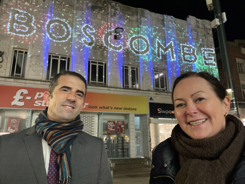 Paul Clarke, Coastal BID chairman, and Fiona McArthur, BID manager, in front of the award-winning projection installation in Boscombe