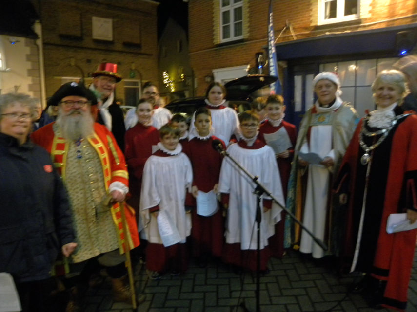 L-R: Major Carole Gadsden, Salvation Army; Chris Brown, town crier; Anthony Oliver; Colin Davey (at back beside Anthony); minster choristers; The Revd Canon Andrew Rowland, Rector; and Mayor Cllr Carol Butter. Photo by John Hughes