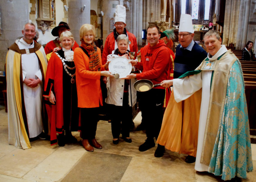 Group photo showing Marilyn Barber from Dorset View/Viewpoint presenting Matthew James with his pizza plate and cutter © Gordon Edgar